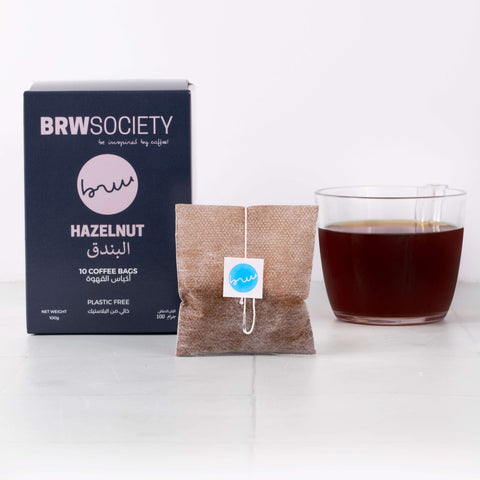 Eco-friendly plastic-free pyramid coffee bags with medium roasted 100% Arabica coffee, blended with hazelnut and milk chocolate notes.