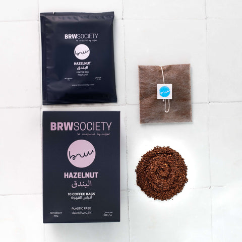 Eco-friendly plastic-free pyramid coffee bags with medium roasted 100% Arabica coffee, blended with hazelnut and milk chocolate notes.