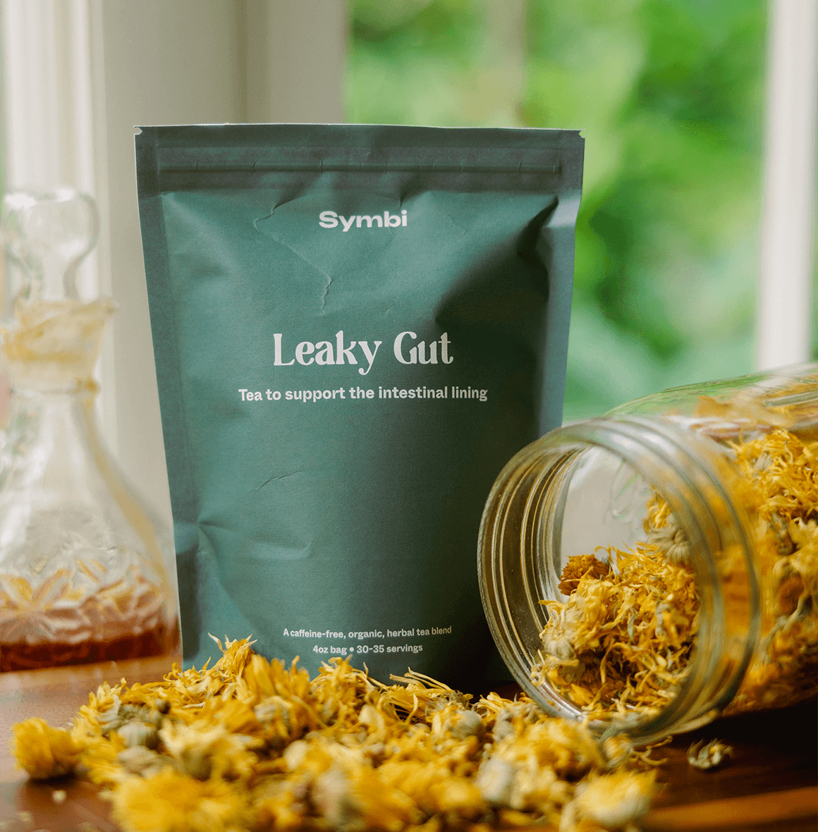 Leaky Gut Tea with marshmallow root, chamomile, calendula, plantain, and ginger—designed to support digestive health, reduce bloating, and help alleviate the symptoms of a leaky gut.