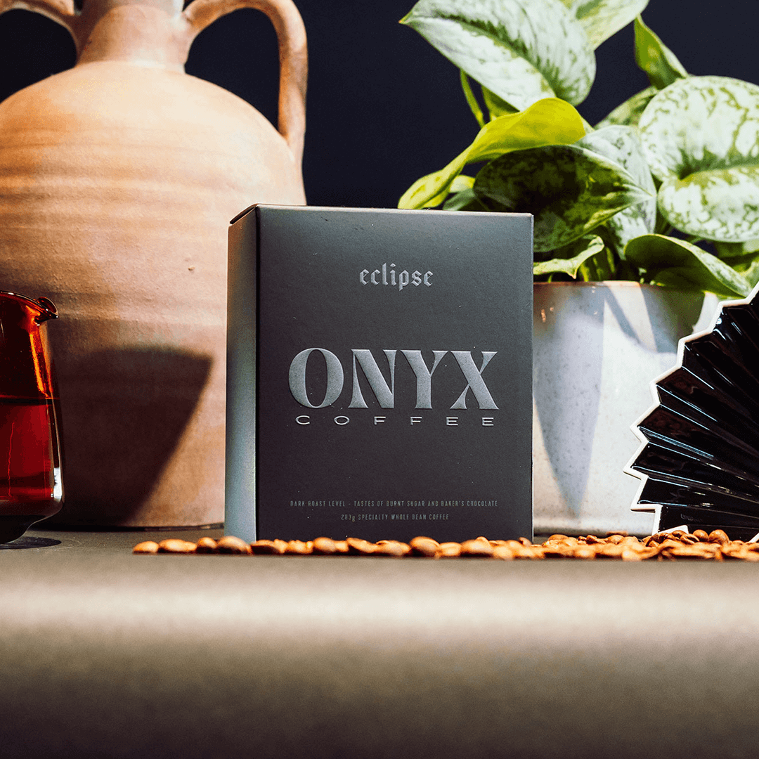 Eclipse dark roast coffee with baker’s chocolate, burnt sugar, and smoked vanilla bean notes, perfect for filter or espresso with milk.