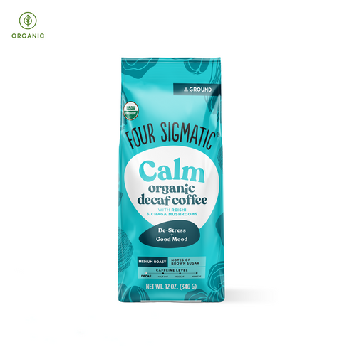 Calm Decaf Coffee by Four Sigmatic in cozy packaging, featuring Swiss Water Process decaf beans and organic Reishi, crafted to ease stress and support calming daily rituals.