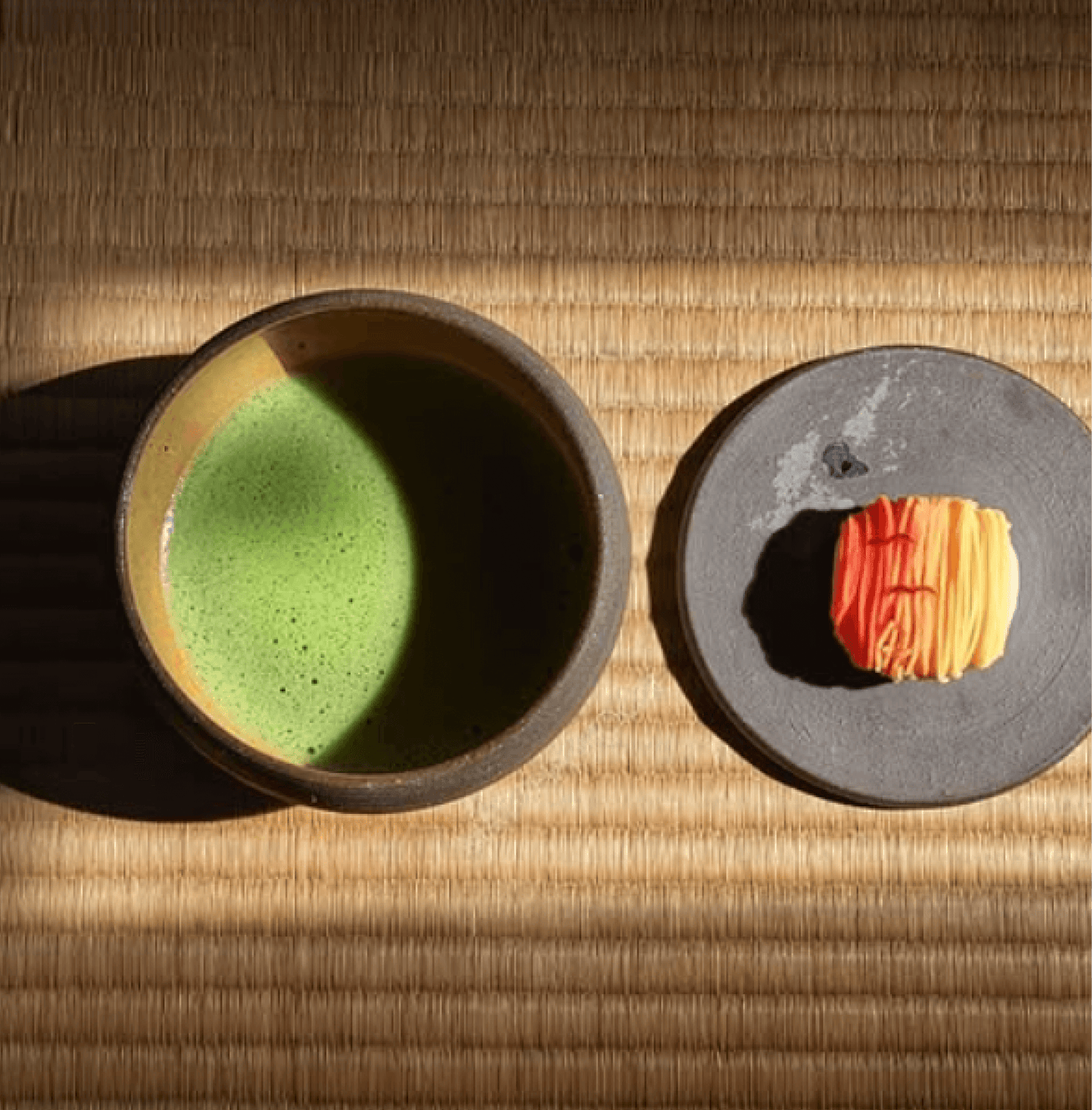 Cup of Daily Zen - Japanese Matcha Green Tea Powder with traditional sweet on tatami mat