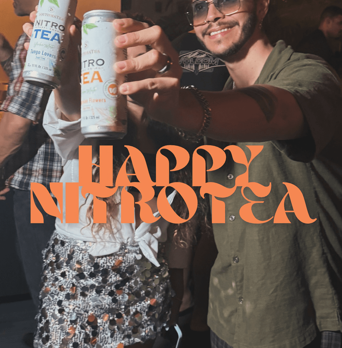 Happy gathering featuring NitroTea - Tango Lovers with colorful cans in hand.