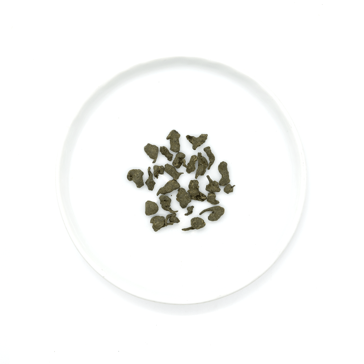 Oolong tea from Fujian, China, hand-rolled and infused with ginseng powder, offering a rich, lingering sweetness in the cup.