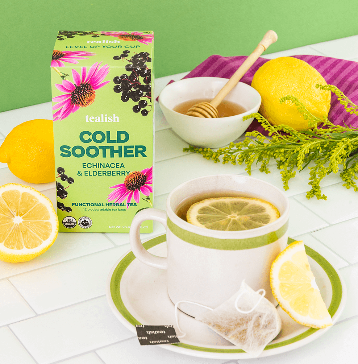 Organic Cold Soother herbal tea with elderberry, echinacea, hibiscus, and rosehip—nourishing, antioxidant-rich, and immune-boosting for soothing relief with a burst of citrus and honey.