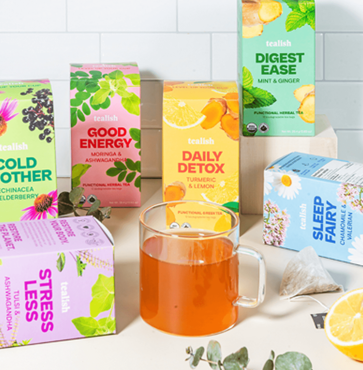 Organic Stress Less green tea with turmeric, lemon, and ginger—citrusy, detoxifying, and revitalizing for body balance and harmony in every sip.