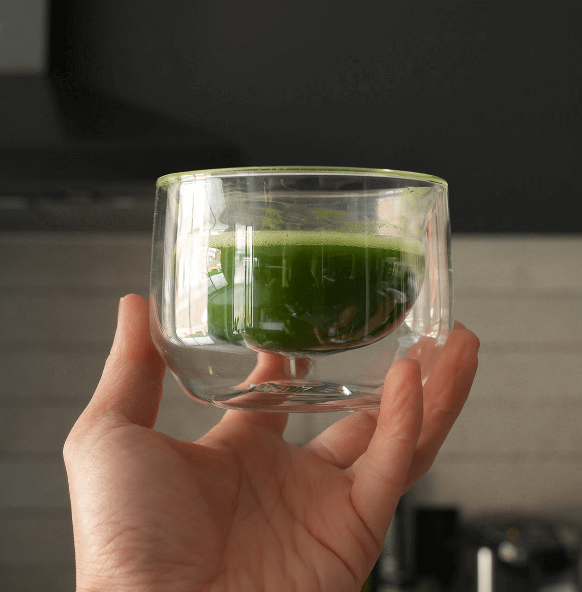 Hand-blown glass mug for whisking, sipping, and serving. Sleek, versatile, and comfortable design for daily use.