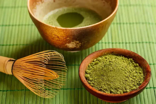 Culinary grade matcha vs Ceremonial grade matcha in a whisk and bowl presentation.