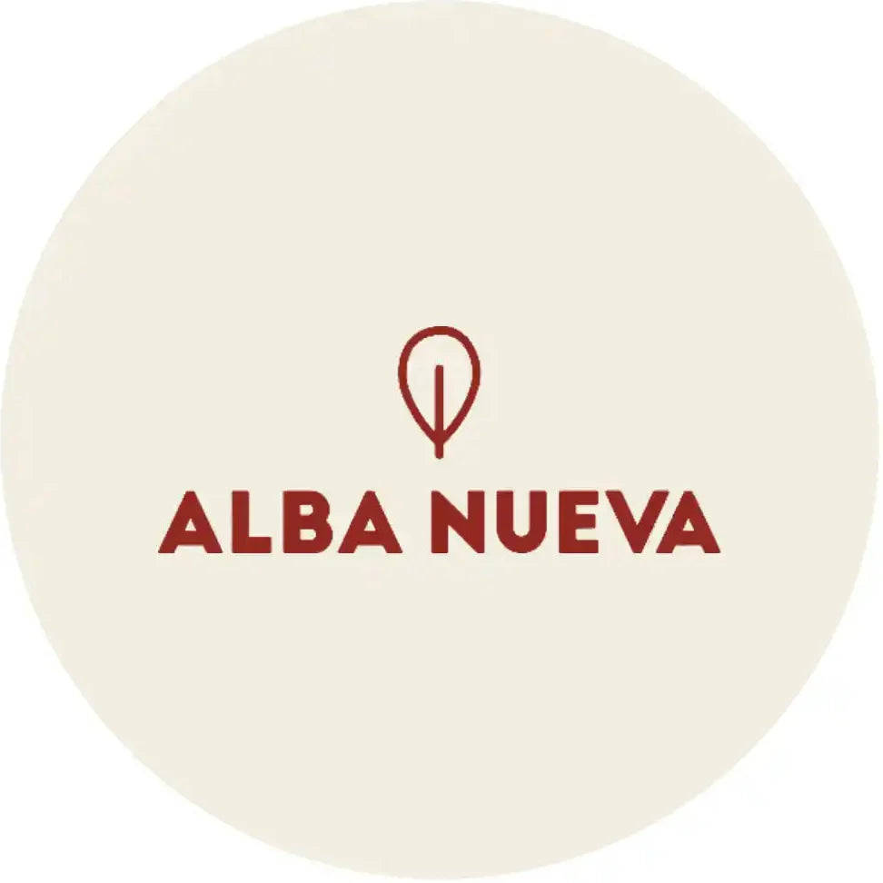 A circular beige graphic with the text 'ALBA NUEVA' in dark red and a small leaf-like logo above it.
