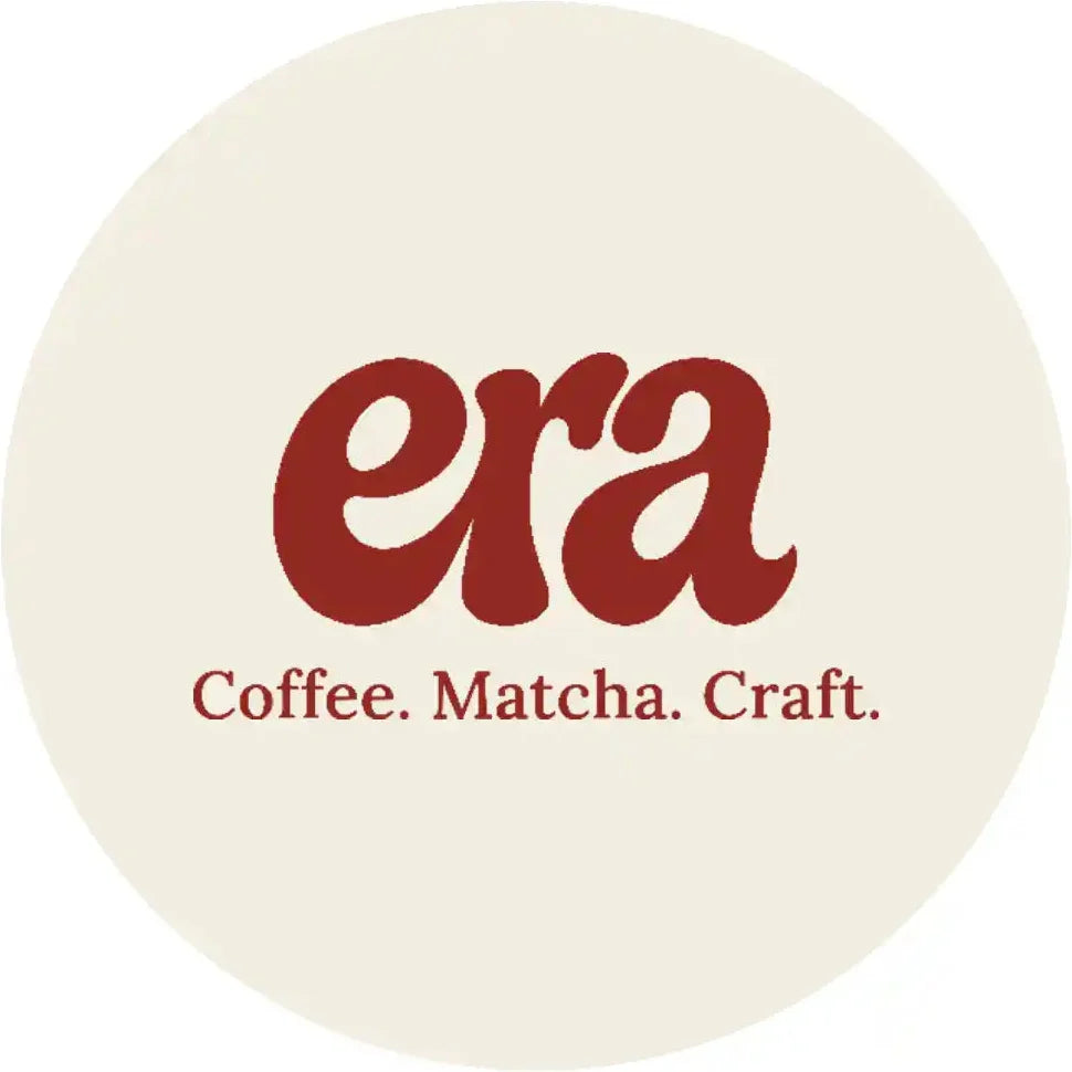 A circular beige graphic with the word 'era' in large dark red serif letters and the smaller text 'Coffee. Matcha.