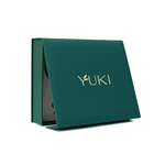 Premium matcha tea ceremony set by Yuki, including a black ceramic chawan, bamboo whisk, scoop, and premium matcha, in a sophisticated green box.