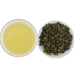 Clarity Silk Dancer Milk Oolong tea with smooth, floral, and milky notes, crafted in Taiwan from the Golden Lily cultivar by an award-winning tea master.