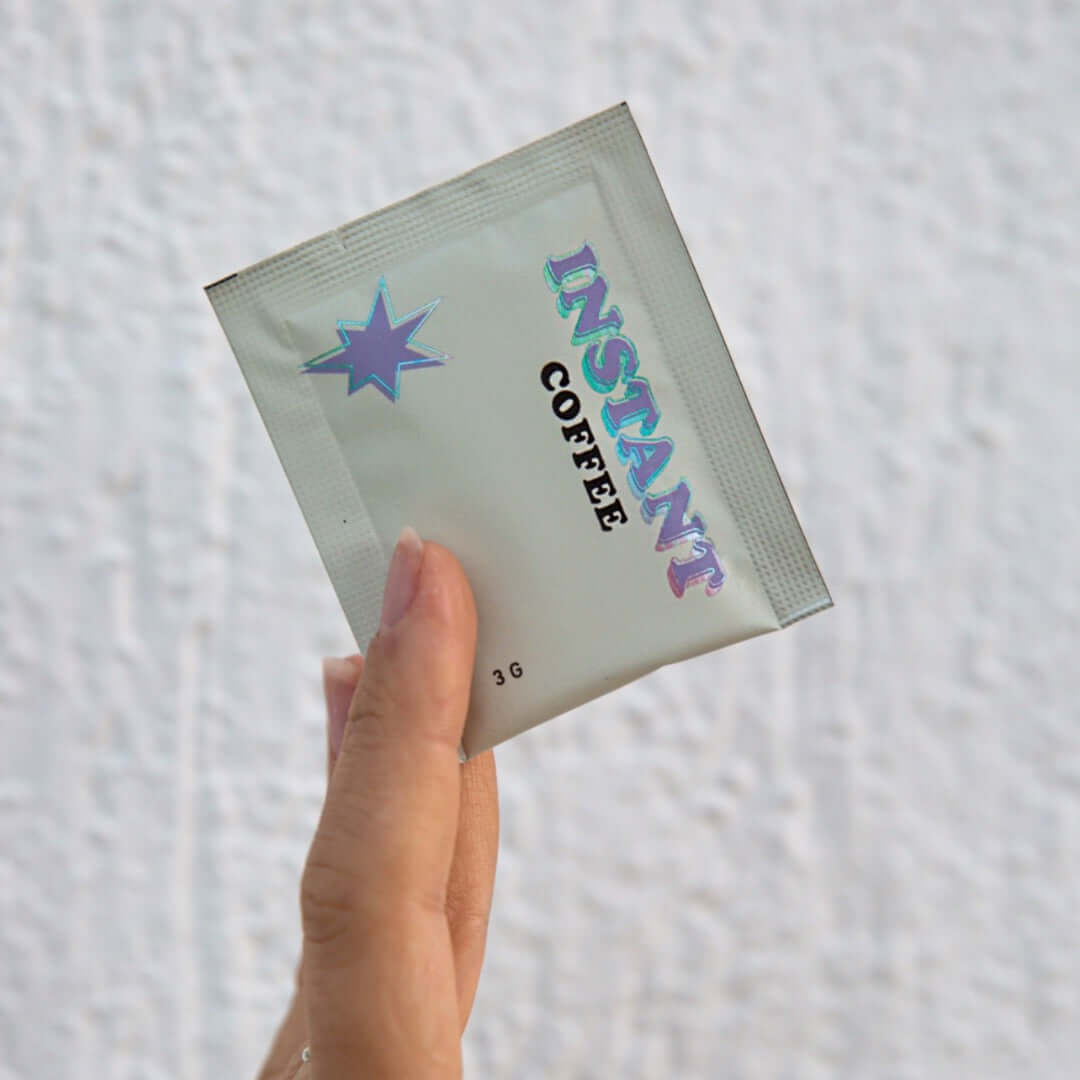 Instant Coffee by Three Coffee in sleek box of 7 sachets, freeze-dried blend with Timor-Leste and Ethiopia origins, crafted for café-quality brews without gear or effort.