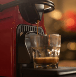 Rich espresso coffee capsules with chocolate, toffee, and roasted nuts notes, perfect for making a flat white at home.