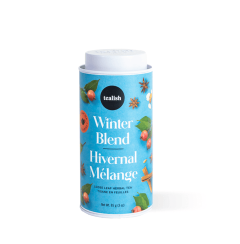 Winter Blend loose leaf herbal tea canister featuring vanilla, almond, hibiscus, and orange zest for warming flavors.