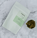 Clarity Silk Dancer Milk Oolong tea with smooth, floral, and milky notes, crafted in Taiwan from the Golden Lily cultivar by an award-winning tea master.