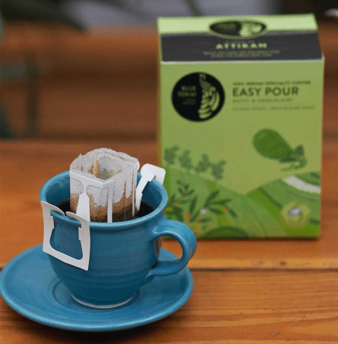 Pack of Blue Tokai Attikan Easy Pour, medium-dark roast with low acidity, notes of figs, dark chocolate, and almonds.