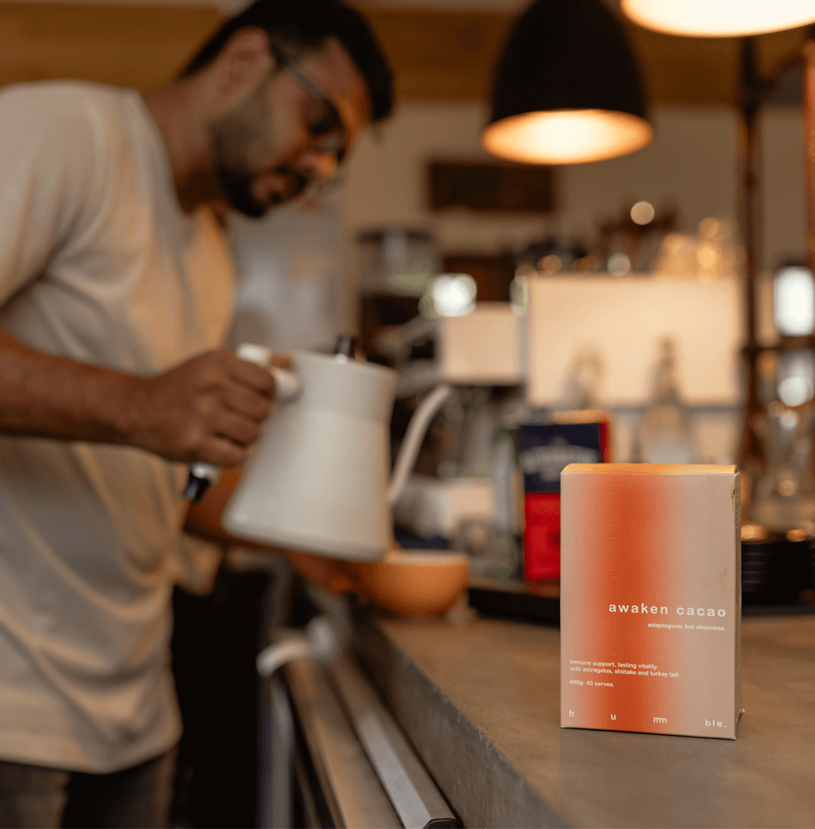 Hummble Awaken Cacao, a rich adaptogenic hot chocolate with astragalus, shiitake, and turkey tail, designed to support immunity, enhance resilience, and promote balance any time of day.