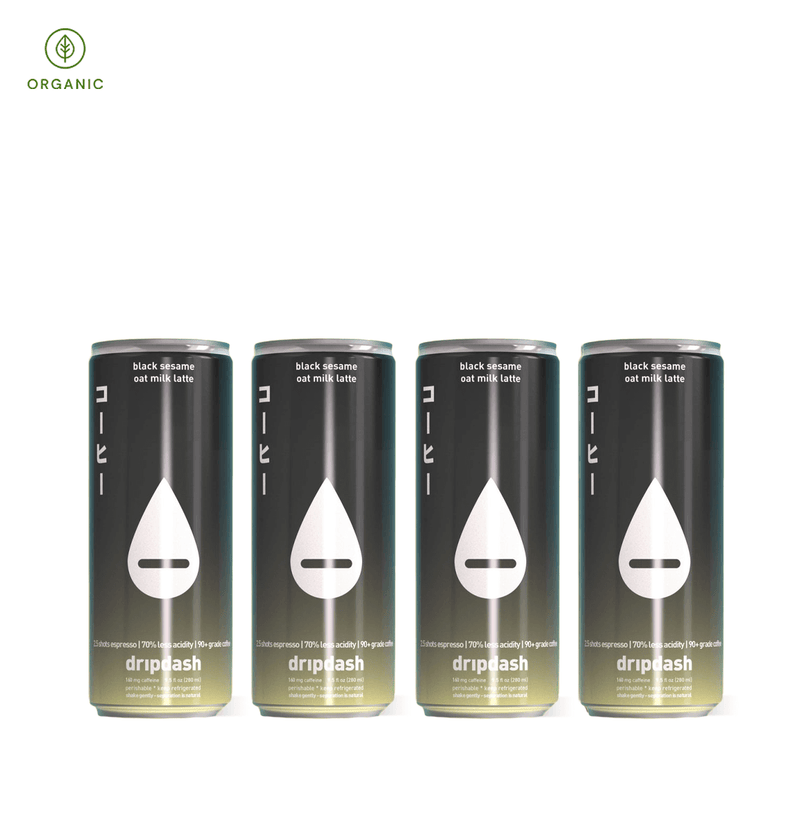 Cans of Dripdash Iced Black Sesame Oat Milk Latte, featuring an organic label.