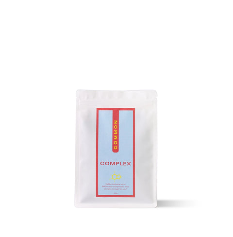Complex Ethiopian coffee pack by COMMON with fruity notes of blueberry, milk chocolate, and Earl Grey.