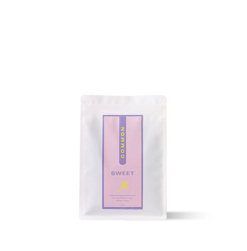 Sweet Brazilian coffee pack by COMMON with milk chocolate, toasted hazelnut, and honey notes.