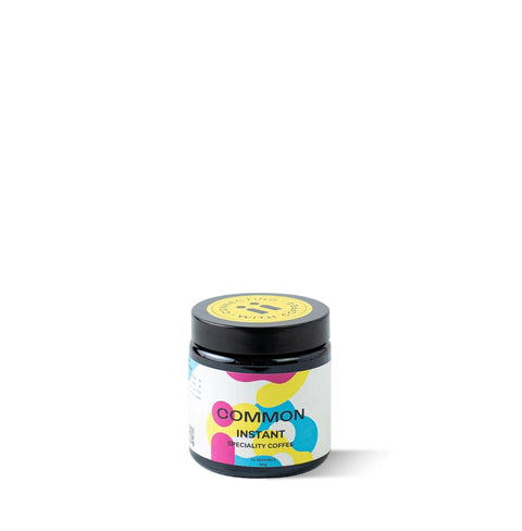 COMMON premium instant coffee jar made from 100% Arabica Brazilian beans, freeze-dried for rich aroma and smooth flavor.