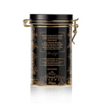 Elegant black canister of Queen of Versailles Limited Reserve Espresso featuring details about its Guatemalan volcanic origin.