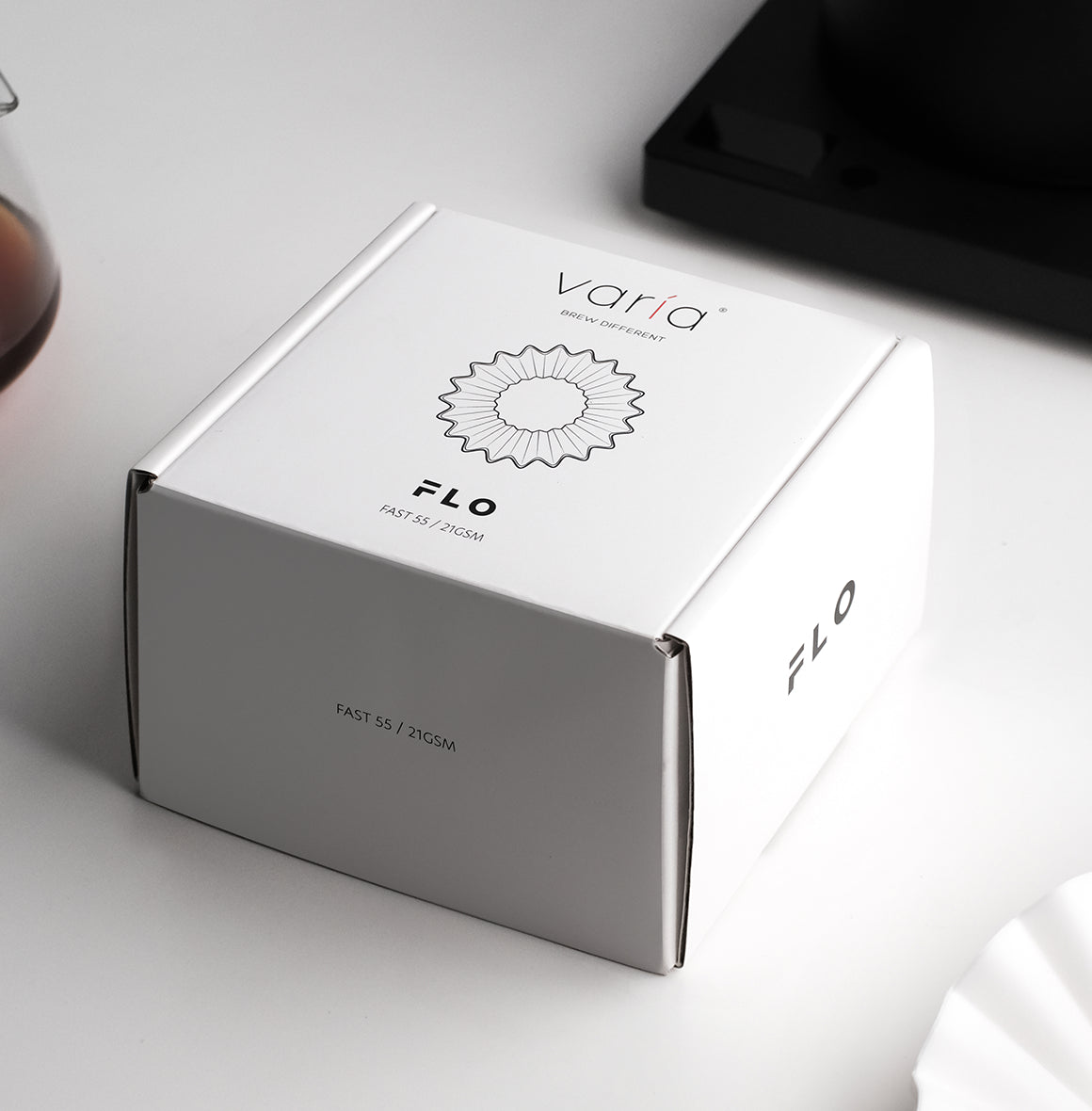 FLO 55 Paper Filters 100x packaging showing Fast 21GSM filter design, ideal for clean brew cups.