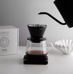 FLO 85 Paper Filters 100x used with Varia FLO dripper for flavorful coffee brewing.
