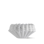 FLO 55 Paper Filters 100x stacked, designed for precise extraction in coffee brewing.