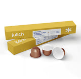 Julith coffee capsules with their yellow packaging boxes on a clean white background. The boxes are labeled 'julith' and 'COLOMBIA EL DIVINO FLORAL SYMPHONY', with three coffee capsules displayed in front.