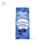 Balance Half Caf Ground Coffee by Four Sigmatic in compostable packaging, crafted with Arabica beans and wild Chaga for immune-boosting support, offering smooth energy and low-acid flavor with half the caffeine.