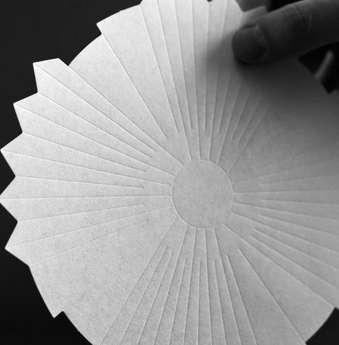 Close-up of Sibarist Fast - Origami Specialty Coffee Paper Filter showcasing design and texture.