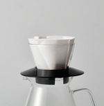 Sibarist B3 Flat Coffee Filter Paper in a pour-over setup on a glass carafe, enhancing coffee clarity and sweetness.