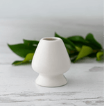 White Whisk Holder in ceramic, designed for drying bamboo matcha whisk, with a smooth, curved body to maintain prong shape.