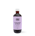 Bottle of organic Cascara Syrup ideal for summer drinks in UAE, made with purified water and cascara pods, on a plain background.