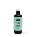 Bottle of Cold Brew concentrate, ideal for iced or milk-based coffee drinks, refreshing and perfect for Spanish lattes.