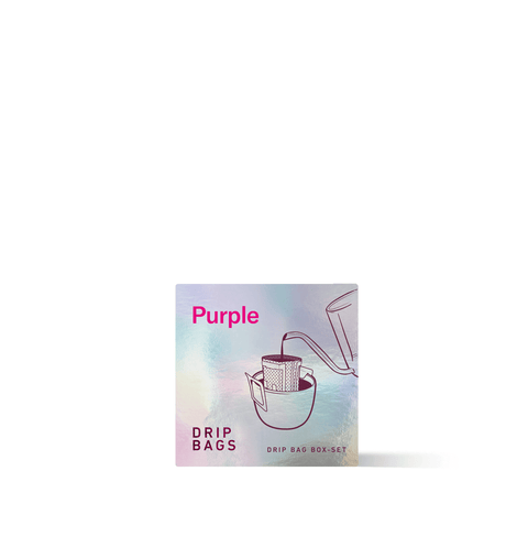 Purple Drip Kit Box featuring sweet, floral micro-lot coffees with deep, fruited notes. Contains drip bags for convenient brewing.