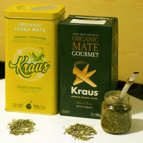 Strong Reserve Yerba Mate and organic yerba mate from Kraus displayed with loose yerba mate leaves.