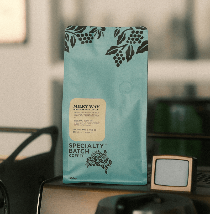Milky Way Dark Roasted Premium Coffee Blend in Specialty Batch packaging on table