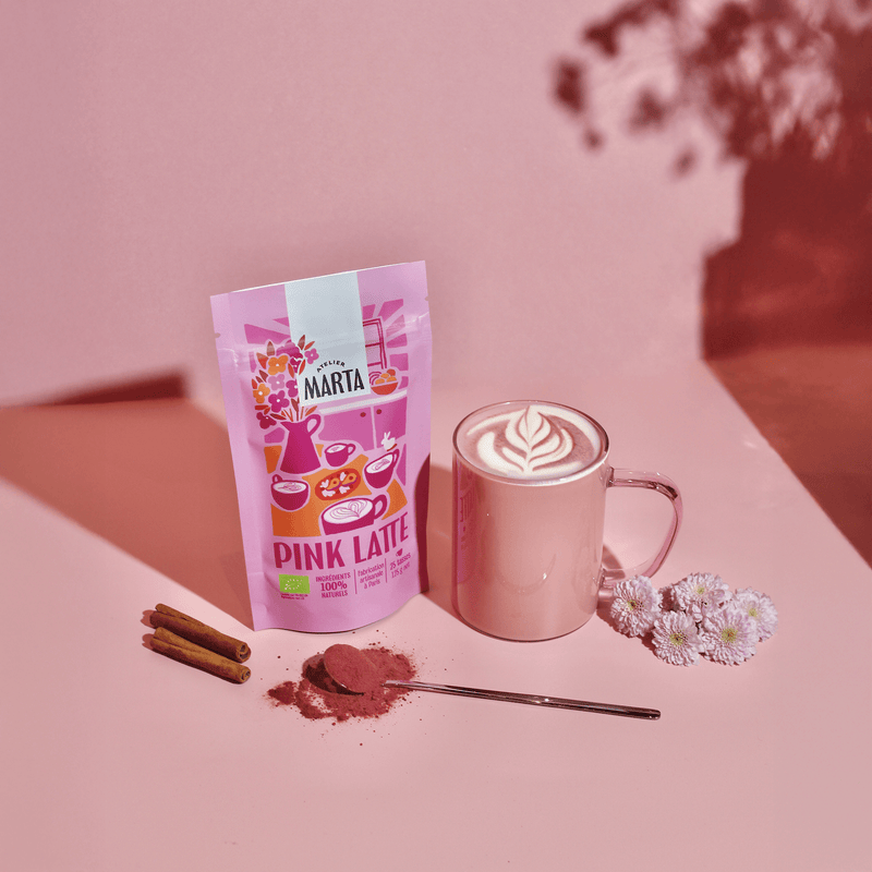 Product image of Organic Pink Latte by Atelier Marta featuring a pink chai latte and packaging.