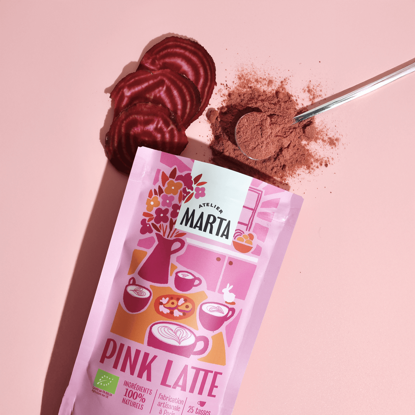 Organic Pink Latte by Atelier Marta with beetroot powder and chai spices in a vibrant pink package.