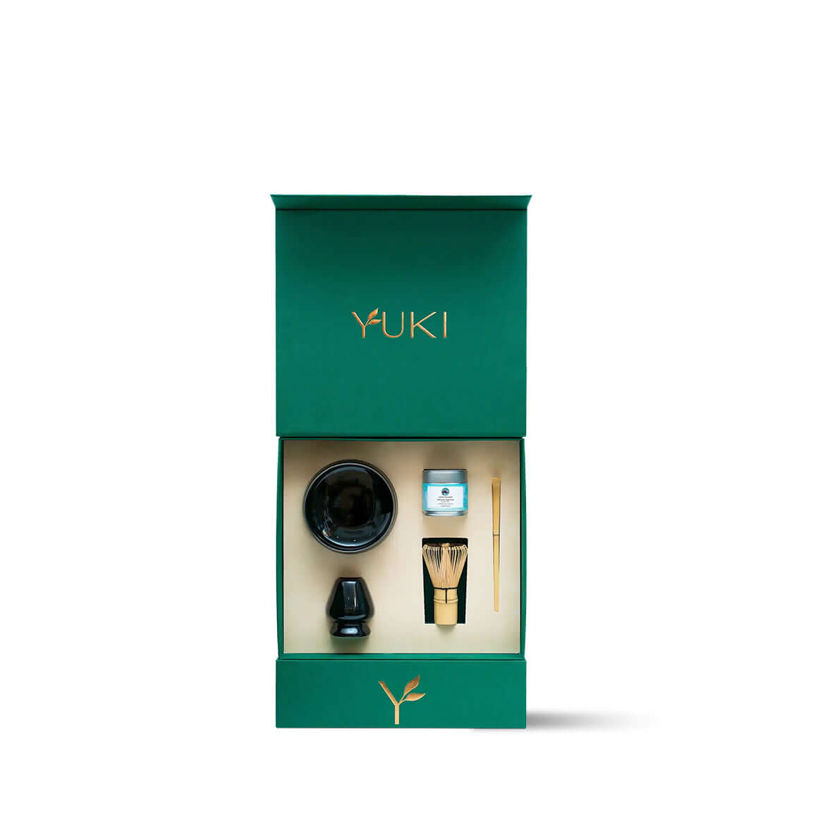 Premium matcha tea ceremony set by Yuki, including a black ceramic chawan, bamboo whisk, scoop, and premium matcha, in a sophisticated green box.