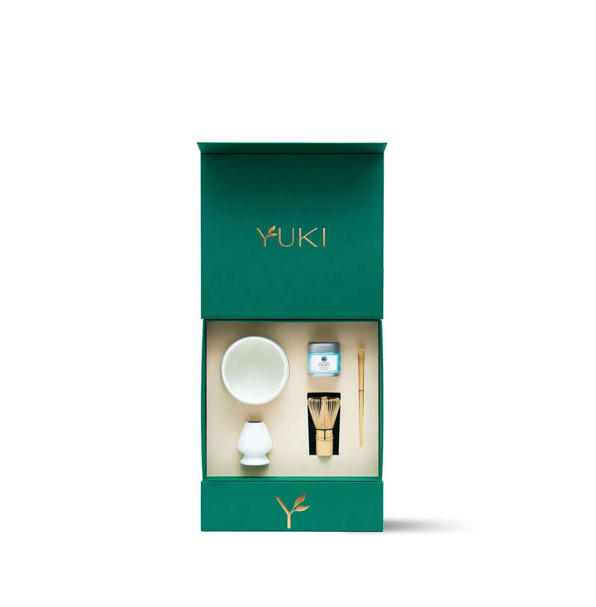 Premium matcha tea ceremony set by Yuki, including a white ceramic chawan, bamboo whisk, scoop, and premium matcha, in a sophisticated green box.