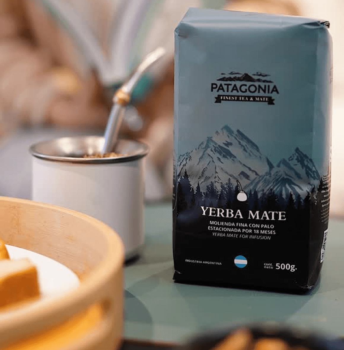Traditional Yerba Mate package with Patagonia branding on a table setting, showcasing premium UAE Argentina blend.