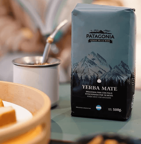 Traditional Yerba Mate package with Patagonia branding on a table setting, showcasing premium UAE Argentina blend.