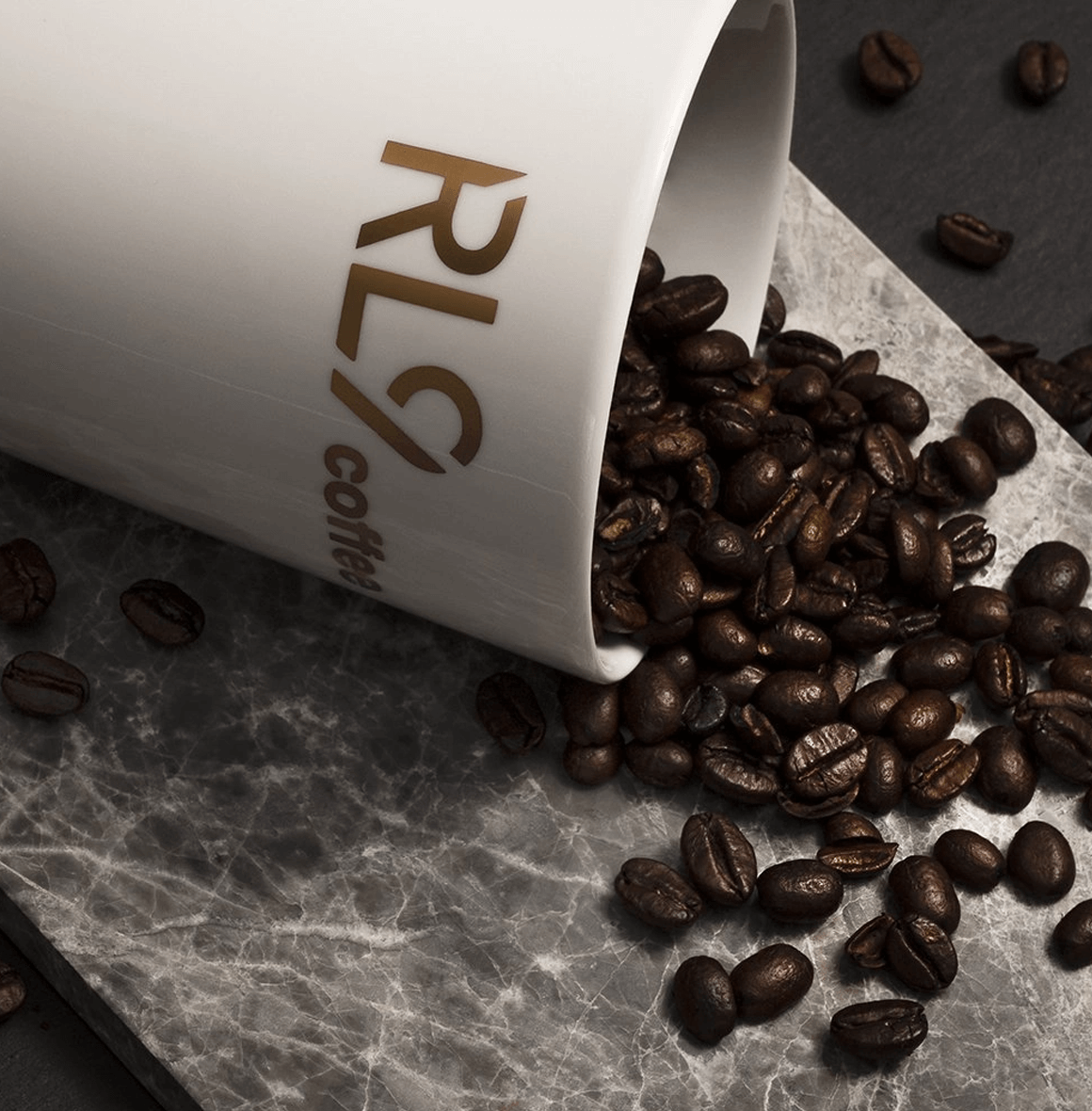 RL9 Coffee Espresso by Robert Lewandowski is a bold dark-roast blend of 100% Arabica beans, delivering thick crema and flavors of dark chocolate, cacao, walnuts, and tobacco.