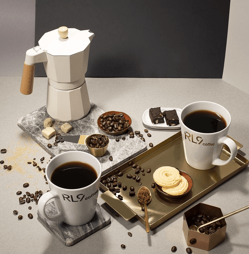RL9 Coffee Espresso by Robert Lewandowski is a bold dark-roast blend of 100% Arabica beans, delivering thick crema and flavors of dark chocolate, cacao, walnuts, and tobacco.