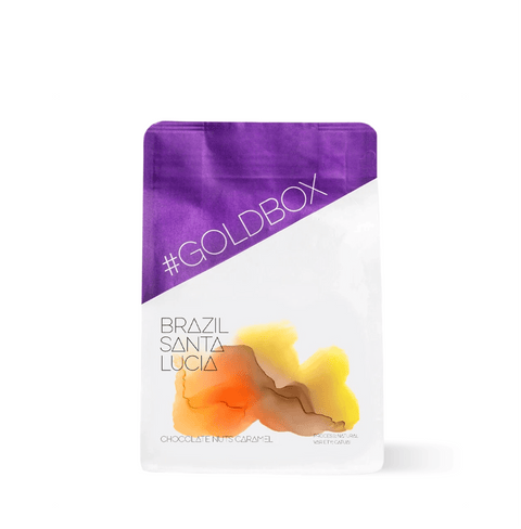 Brazil Santa Lucia Specialty Coffee packaging with purple label and coffee artwork.