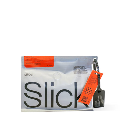 Pack of Slick Coffee Co. Bishan Wate Espresso Roast – Ethiopian coffee with fruity notes of apricot, strawberry, and Earl Grey.